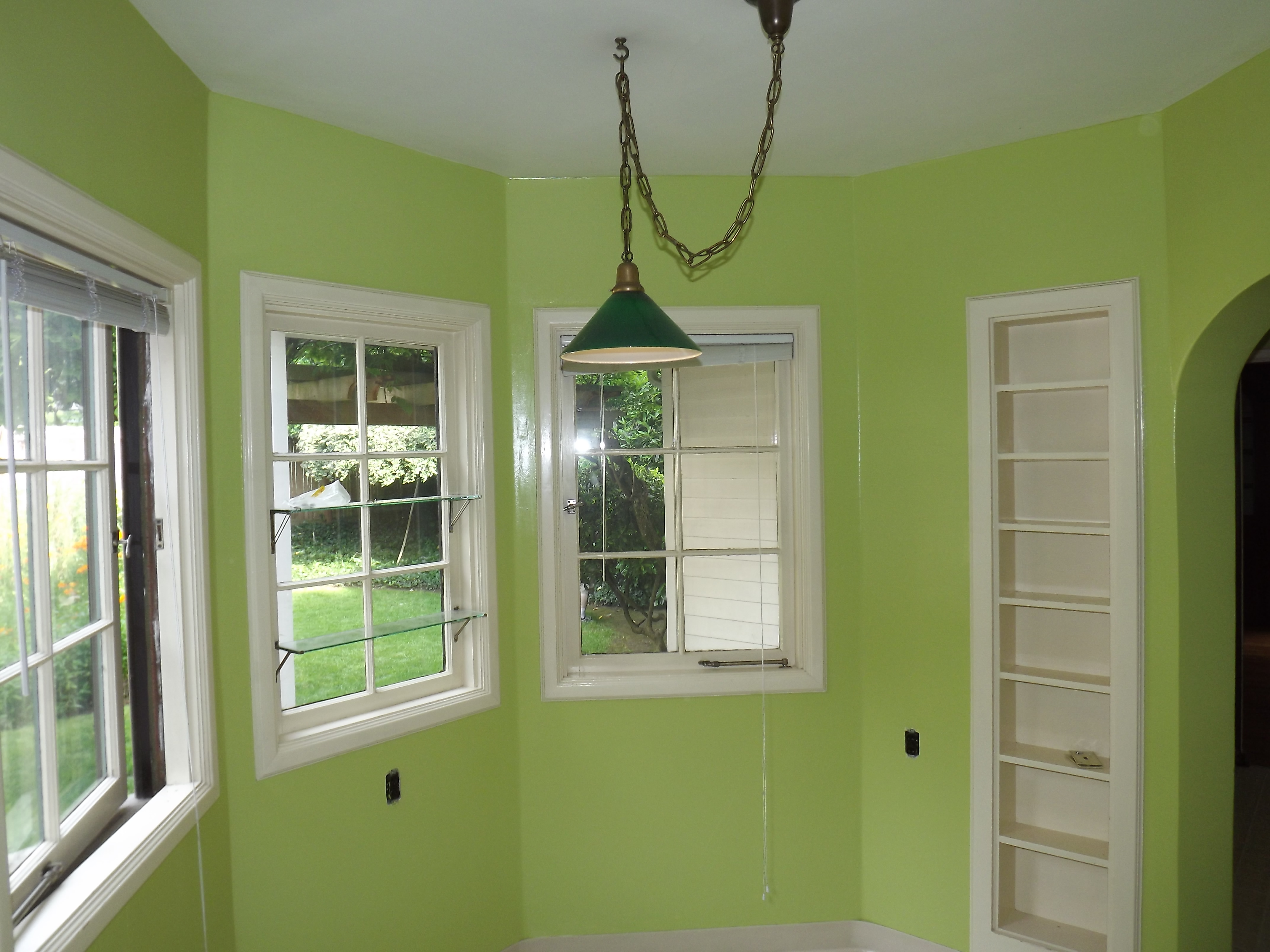 Professional exterior painting Portland - Large residential home with white stucco and stone accents by ACGI